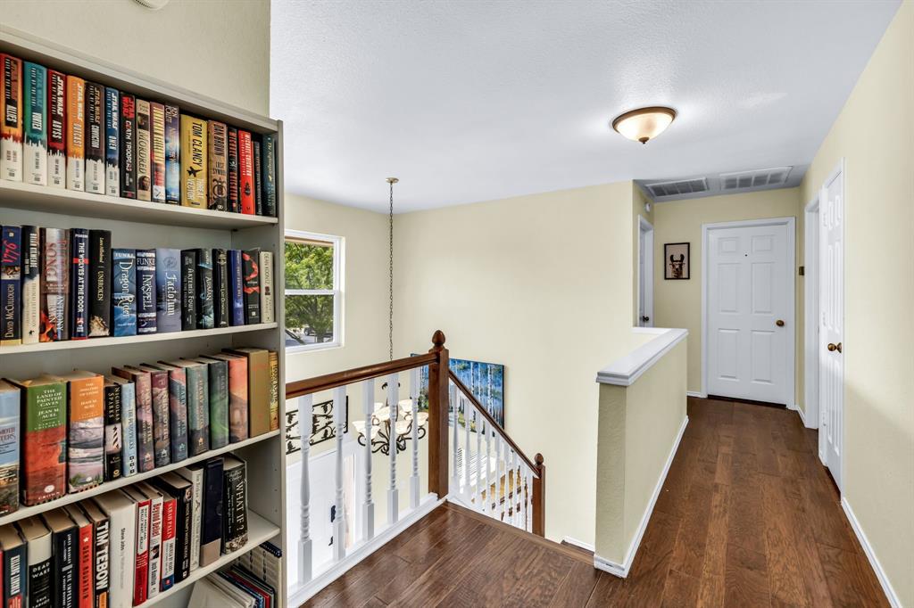 720 Bridget Way Hurst, TX 76054 - Photo 19 of 40 a view of an entryway with wooden floor