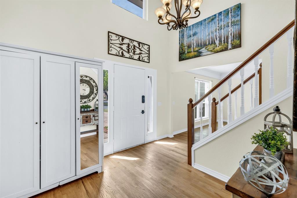 720 Bridget Way Hurst, TX 76054 - Photo 2 of 40 a view of an entryway with wooden floor