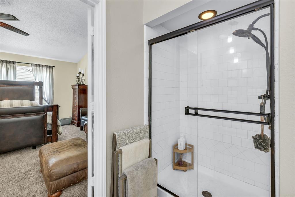 720 Bridget Way Hurst, TX 76054 - Photo 23 of 40 a en suite bathroom with a shower and a sink