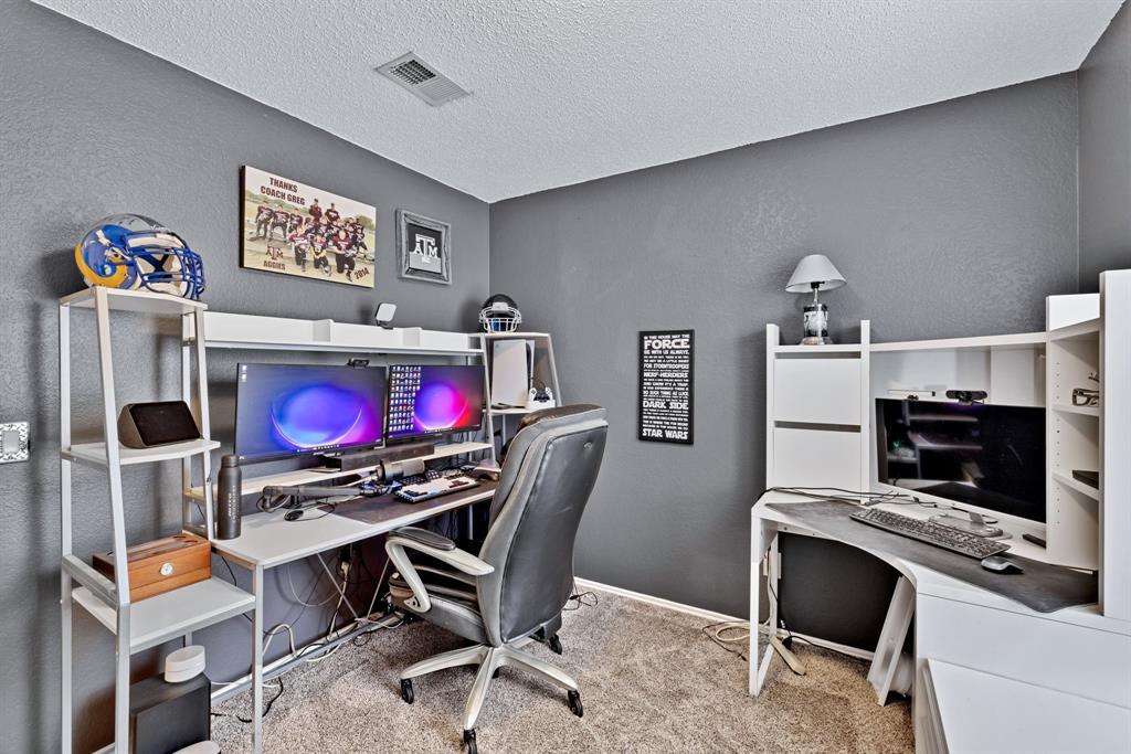 720 Bridget Way Hurst, TX 76054 - Photo 25 of 40 a room with furniture and a window