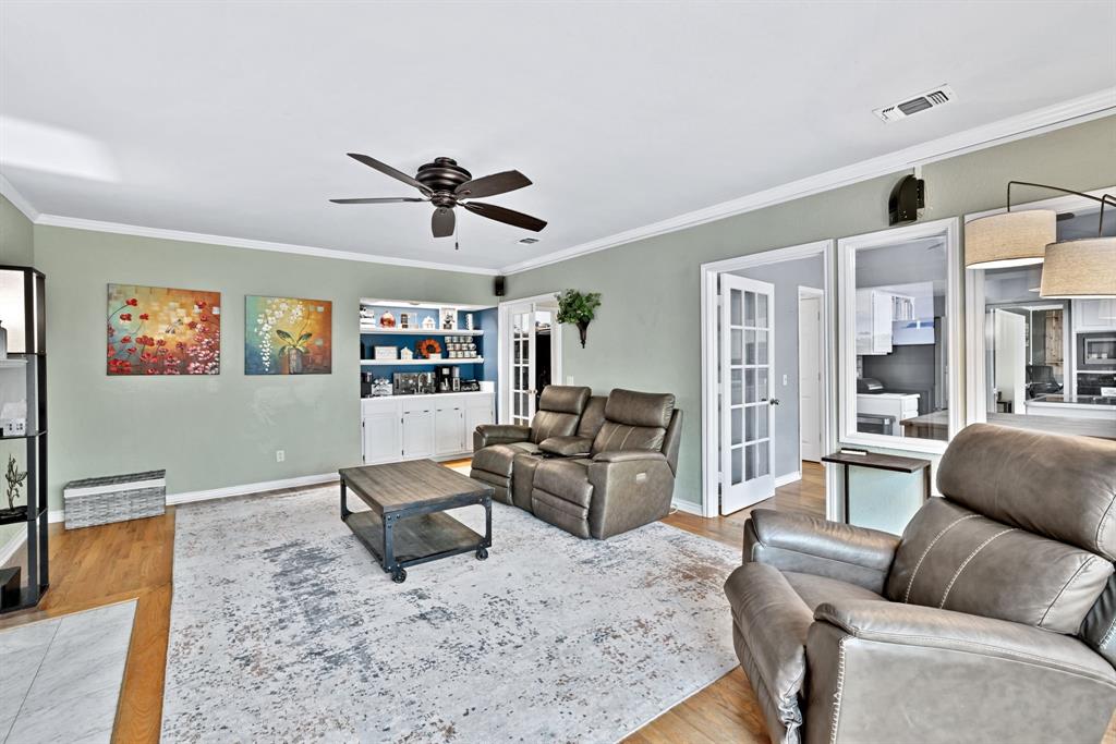 720 Bridget Way Hurst, TX 76054 - Photo 5 of 40 a living room with furniture and a flat screen tv