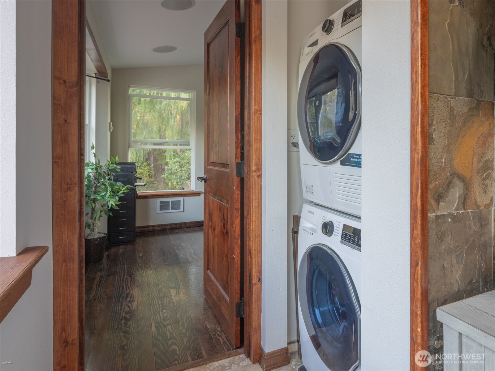 5440 East Grapeview Loop Road Allyn, WA 98524 - Photo 14 of 30 a view of a hallway with washer and dryer