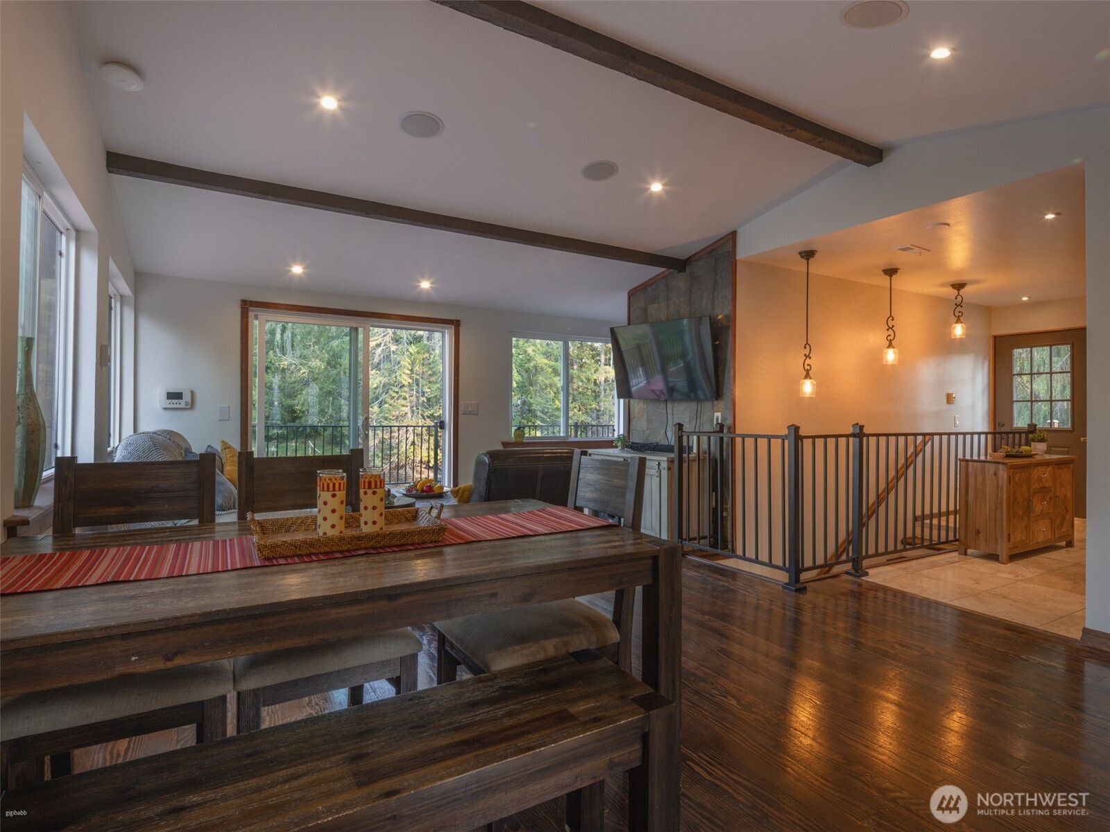 5440 East Grapeview Loop Road Allyn, WA 98524 - Photo 5 of 30 a view of a dining room with furniture window and wooden floor