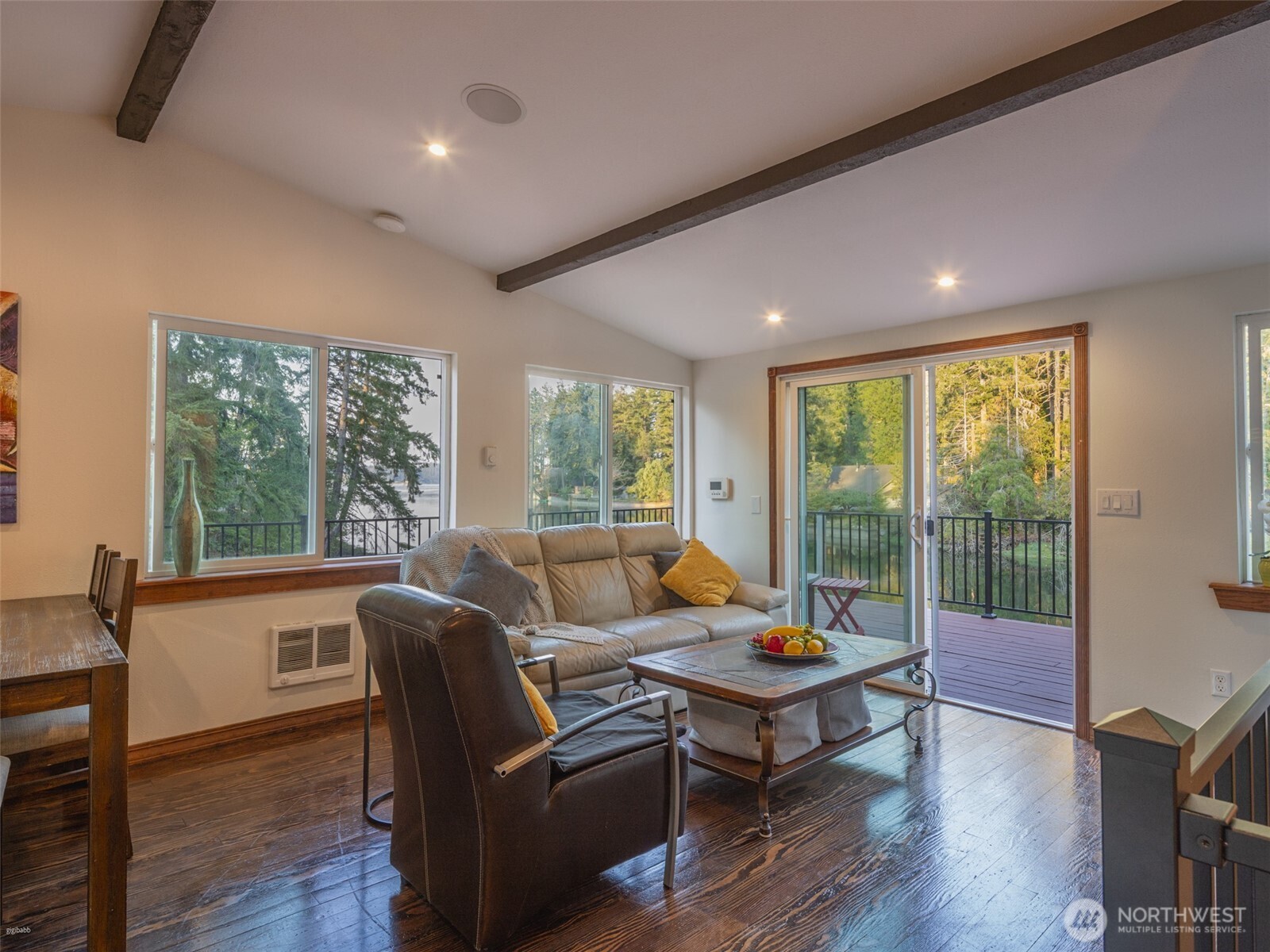 5440 East Grapeview Loop Road Allyn, WA 98524 - Photo 6 of 30 a living room with furniture and a large window