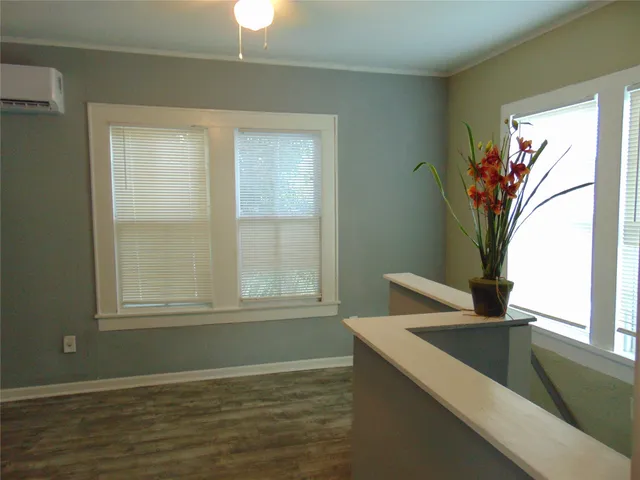 wooden floor and windows in a room