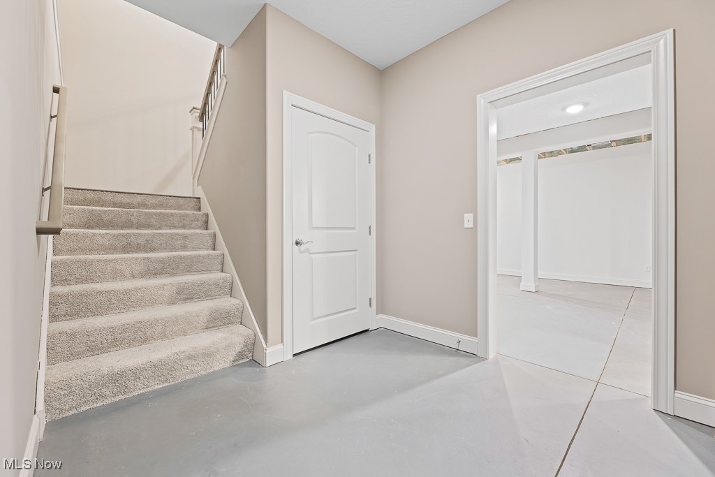 9340 Yale Road Diamond, OH 44412 - Photo 35 of 50 LL foyer in basement near the tornado shelter and partially finished basement
