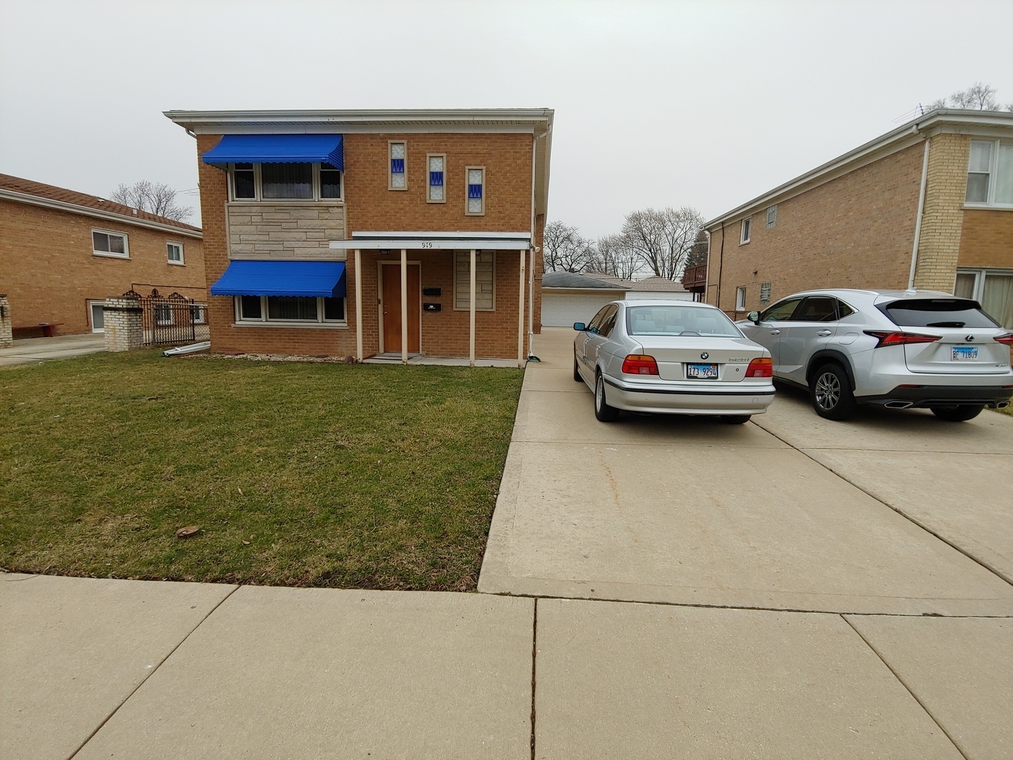 919 Addison Road Addison, IL 60101 - Photo 3 of 24 a view of street with parked cars
