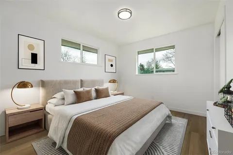 a bedroom with bed and a window