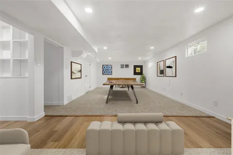 a living room with furniture and a table