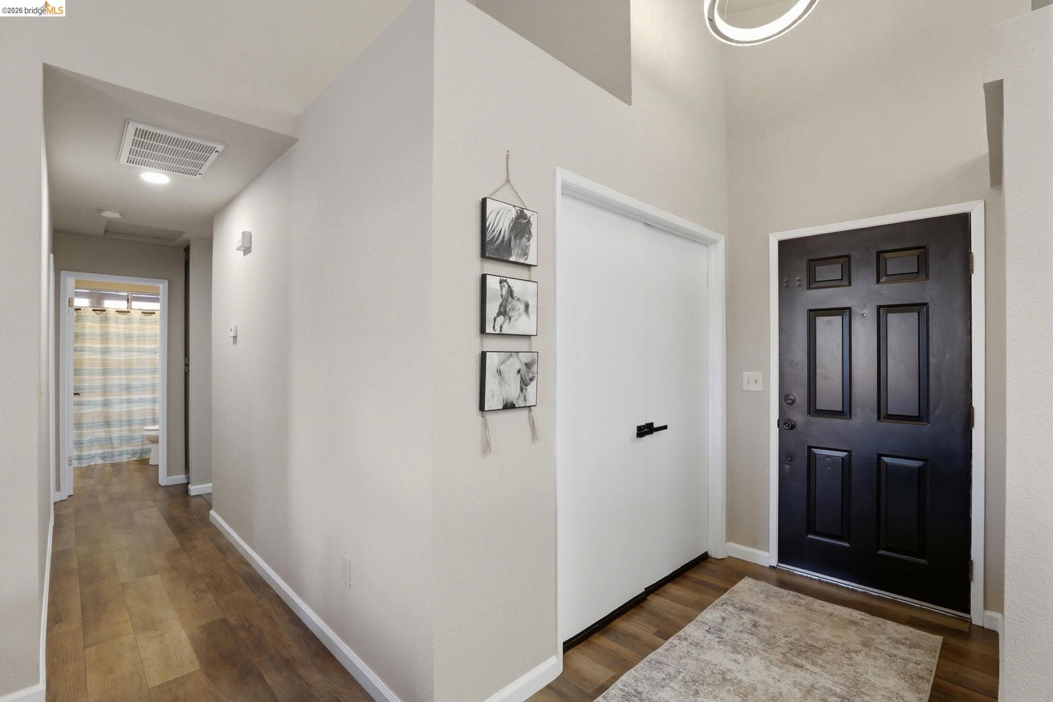 799 Morgans Ranch Circle Galt, CA 95632 - Photo 5 of 36 Entrance foyer with dark wood-type flooring
