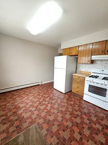 a view of kitchen and utility room