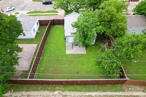swimming pool with a garden and trees