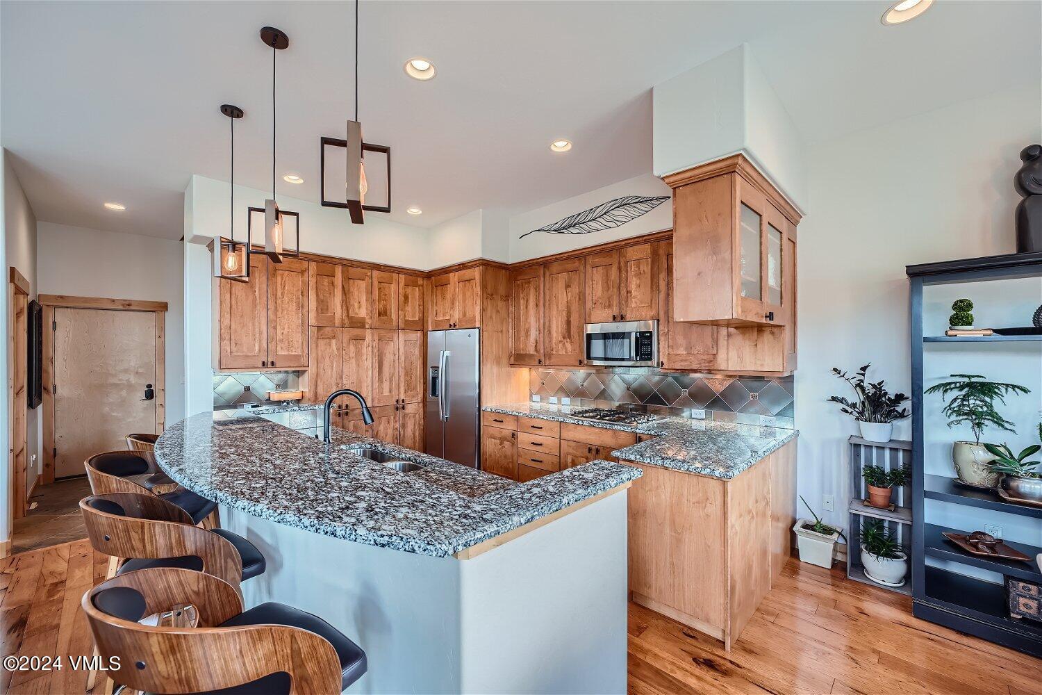 104 North Brett Edwards, CO 81632 - Photo 11 of 32 a kitchen with granite countertop lots of counter top space and furniture
