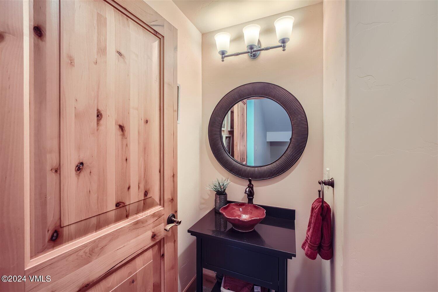104 North Brett Edwards, CO 81632 - Photo 14 of 32 a bathroom with a sink and a mirror