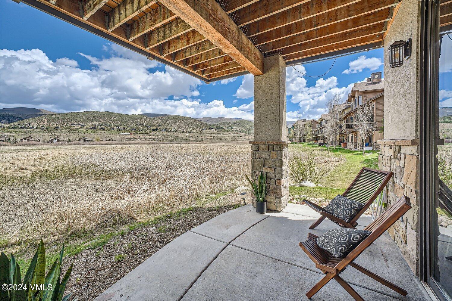 104 North Brett Edwards, CO 81632 - Photo 27 of 32 a view of a porch with furniture and a yard