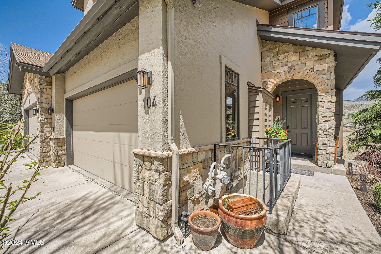 104 North Brett Edwards, CO 81632 - Photo 3 of 32 a front view of a house with outdoor seating