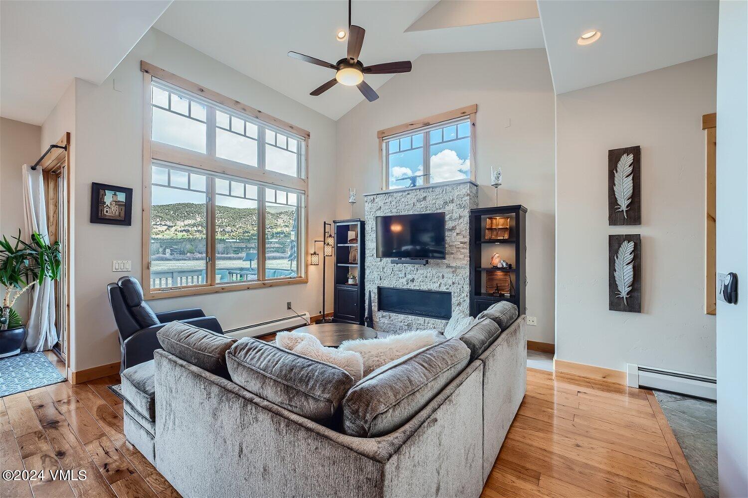 104 North Brett Edwards, CO 81632 - Photo 6 of 32 a living room with furniture and a floor to ceiling window