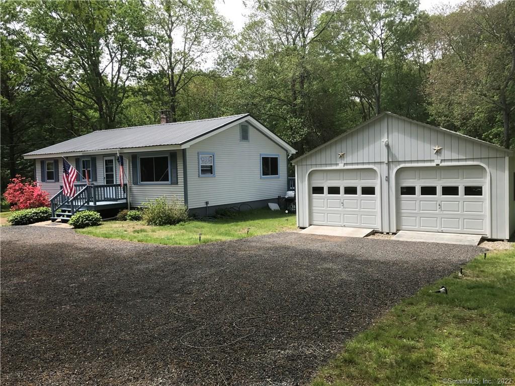 21 Littlefield Road Scotland, CT 06247 - Photo 1 of 1 a view of a house with a yard and large trees