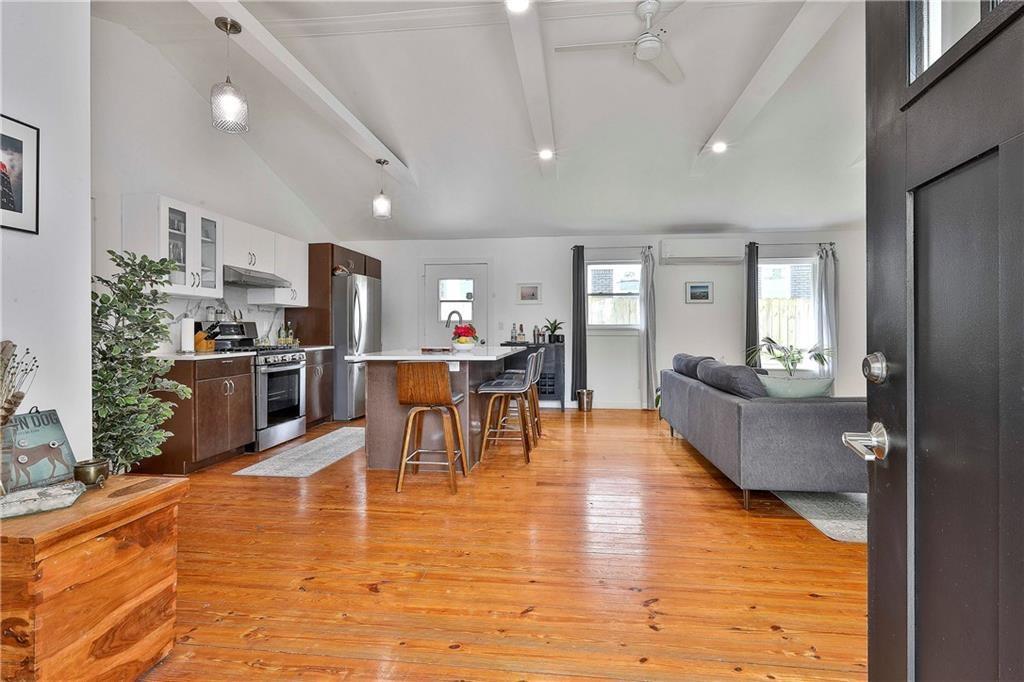 2037 A Lively Ridge Road Northeast Atlanta, GA 30329 - Photo 1 of 15 a dining room with furniture and wooden floor