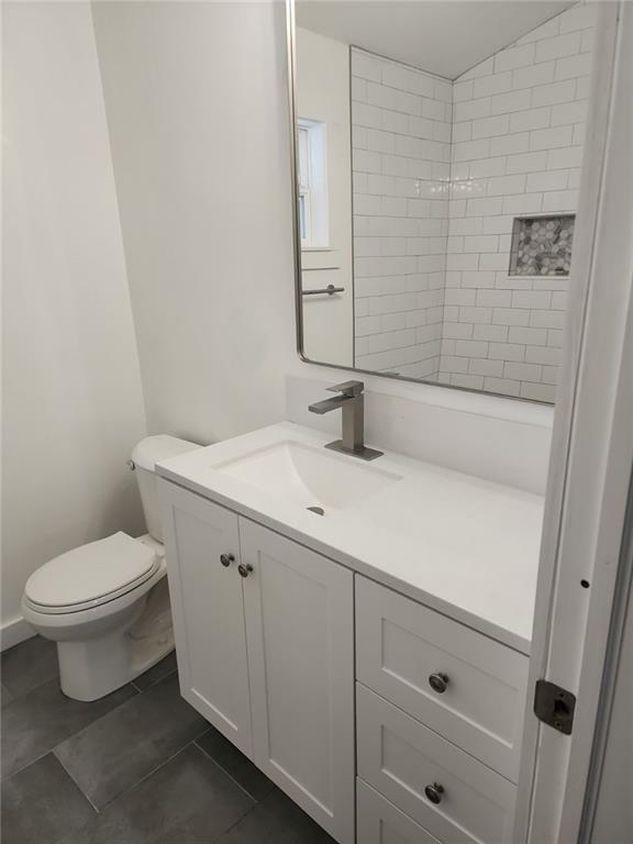 2037 A Lively Ridge Road Northeast Atlanta, GA 30329 - Photo 7 of 15 a bathroom with a sink and a toilet