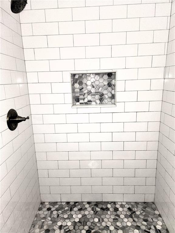 2037 A Lively Ridge Road Northeast Atlanta, GA 30329 - Photo 8 of 15 a bathroom with a shower