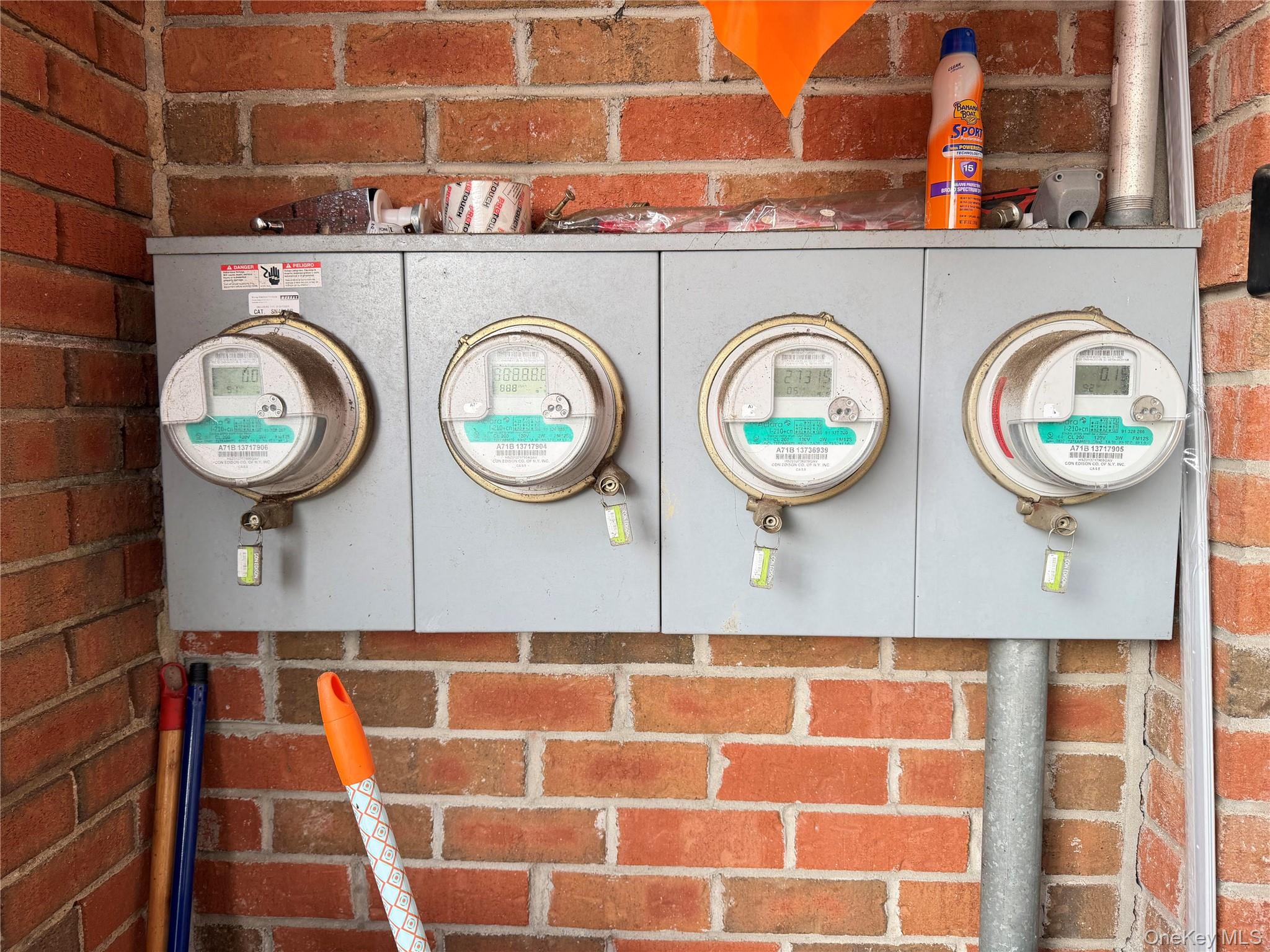 94-81 218th Street Queens, NY 11428 - Photo 2 of 2 Laundry area with brick wall