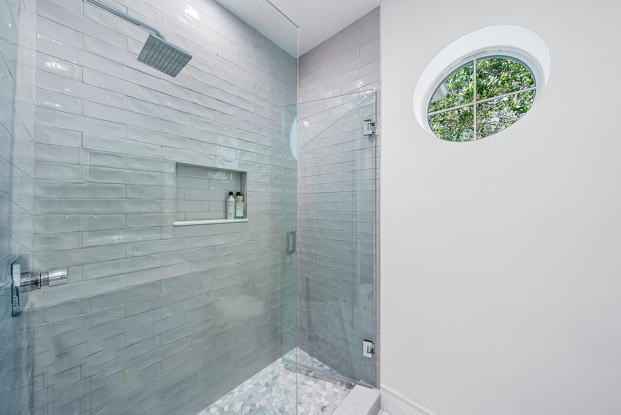 312 Bougainvillea Drive Jupiter, FL 33458 - Photo 27 of 44 a bathroom with a sink