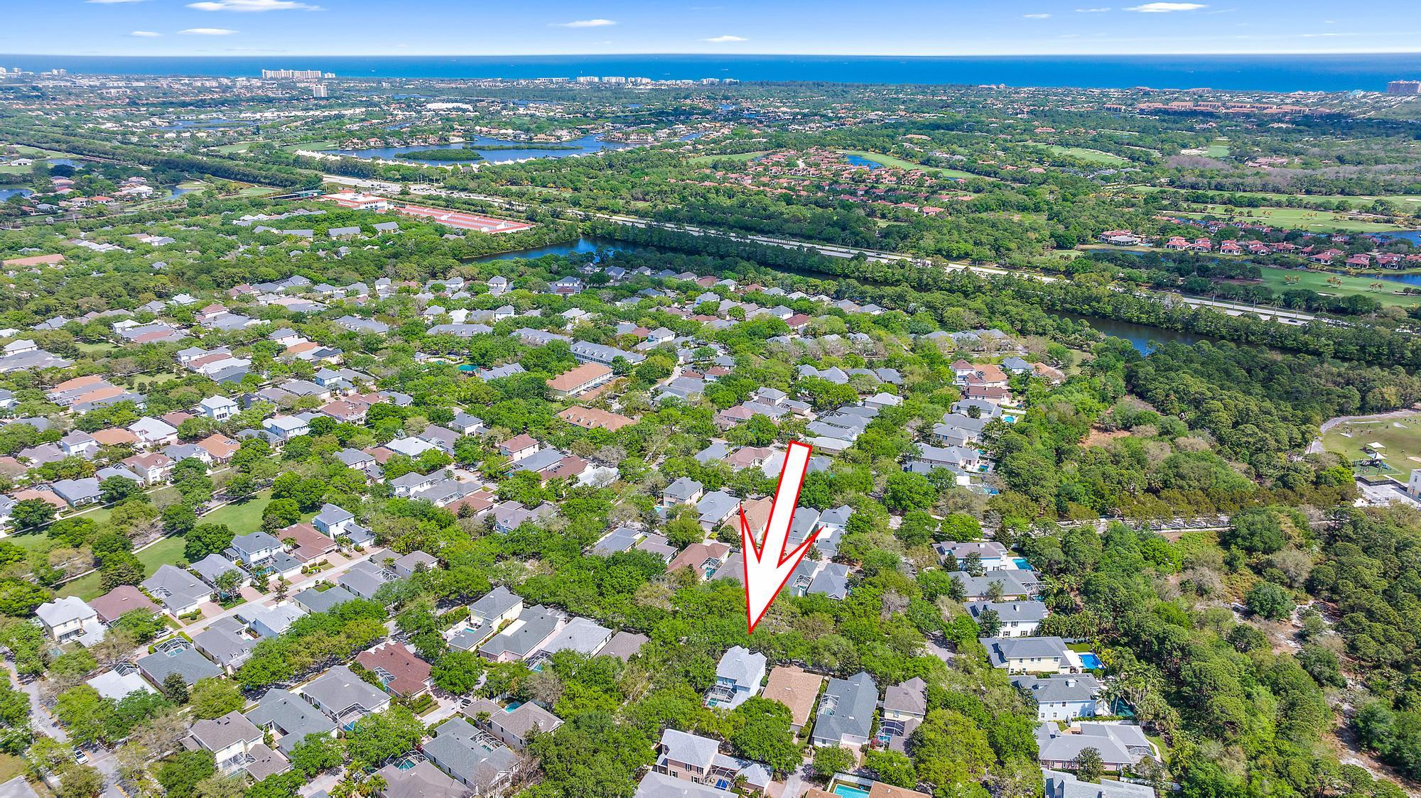312 Bougainvillea Drive Jupiter, FL 33458 - Photo 38 of 44 a view of city with lush green forest