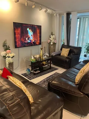 a kitchen with a sink and a stove top oven