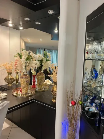 a kitchen with stainless steel appliances a stove a microwave and a refrigerator