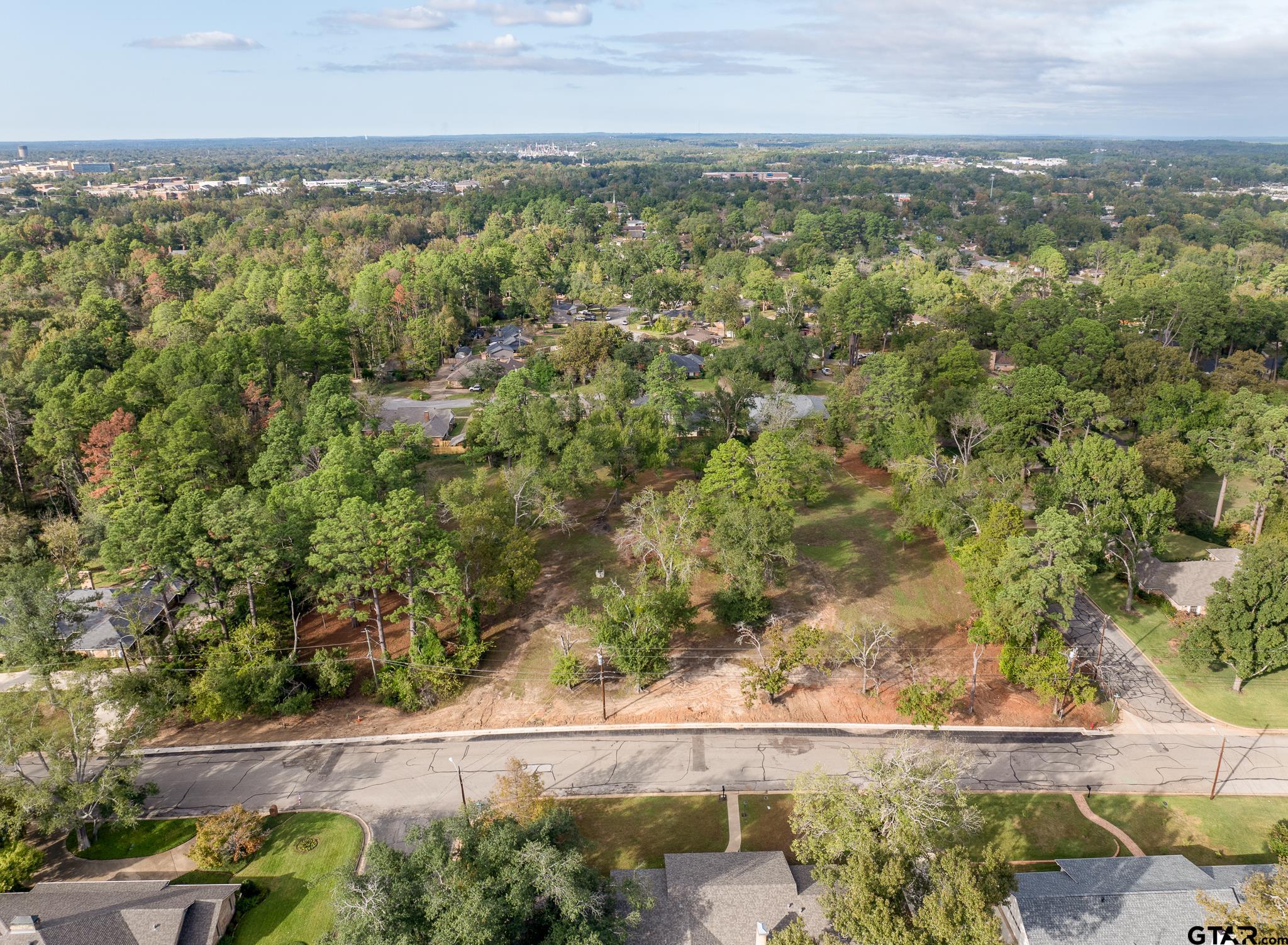 2006 McDonald Road Tyler, TX 75701 - Photo 4 of 13 an aerial view of residential houses with outdoor space