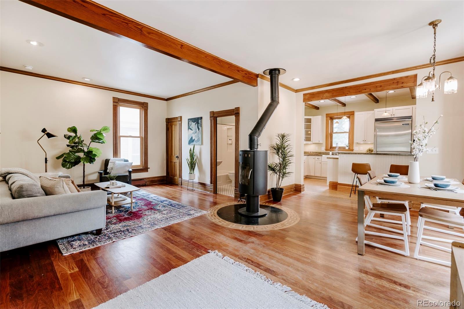 1718 Mapleton Avenue Boulder, CO 80302 - Photo 3 of 39 a living room with furniture windows and wooden floor