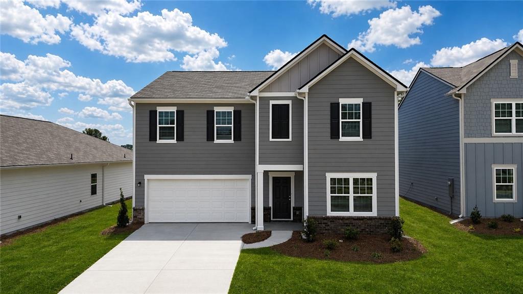 190 Otway Loop Winder, GA 30680 - Photo 1 of 17 a front view of a house with a yard and garage