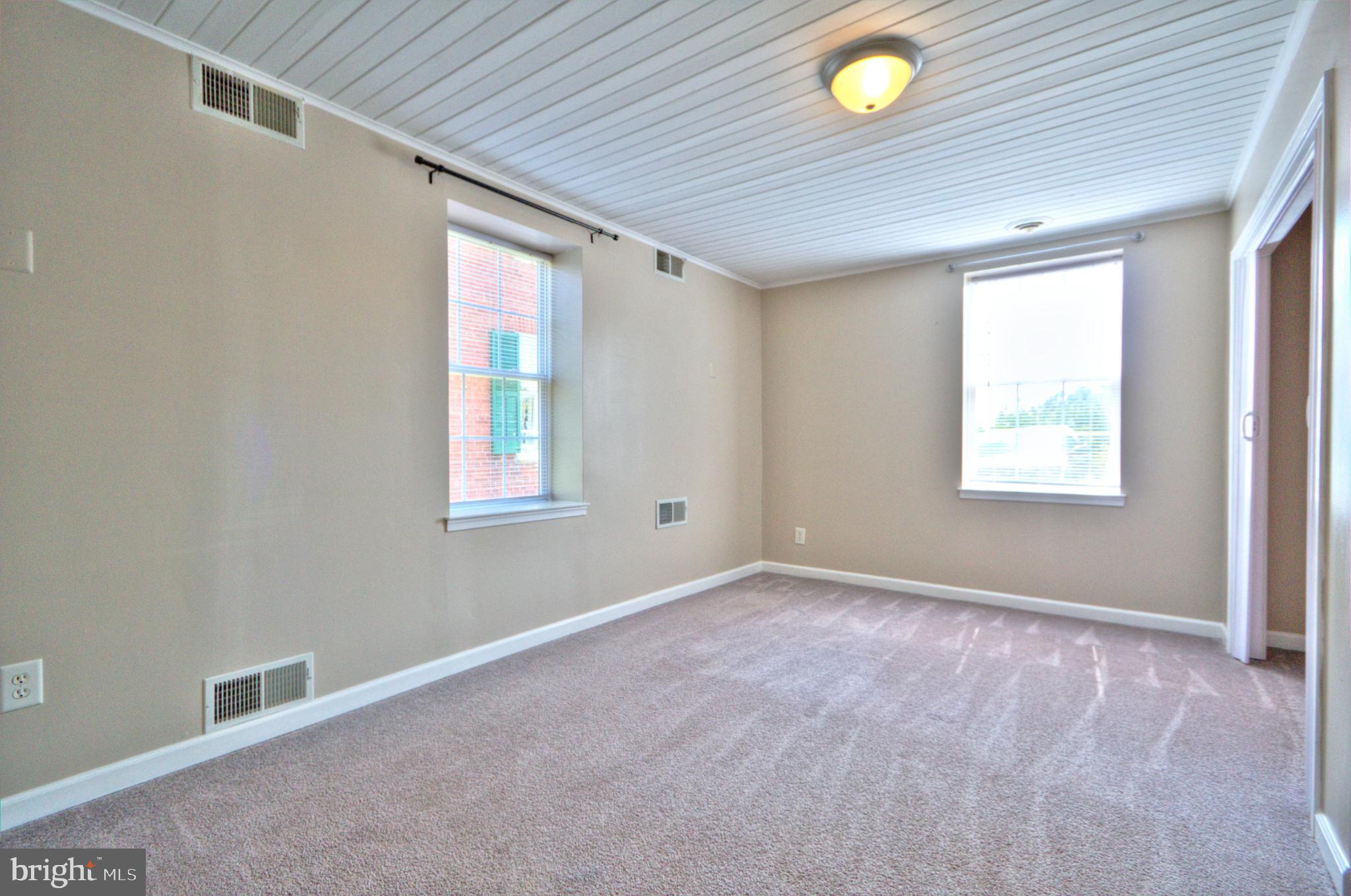6200 Middleburg Road Keymar, MD 21757 - Photo 11 of 18 wooden floor in an empty room with a window