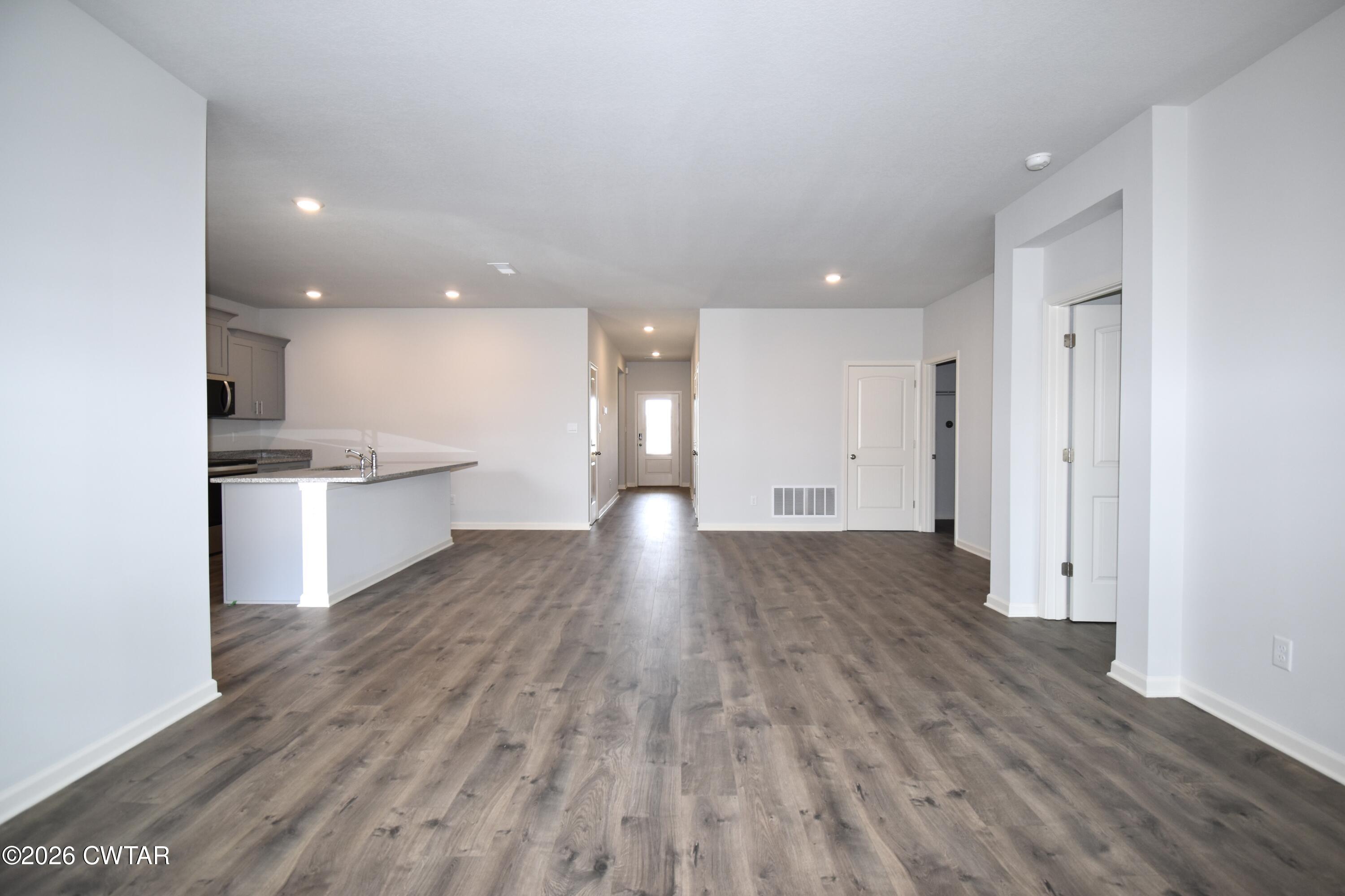 71 Clarendon Cove Jackson, TN 38305 - Photo 9 of 18 a view of kitchen with wooden floor