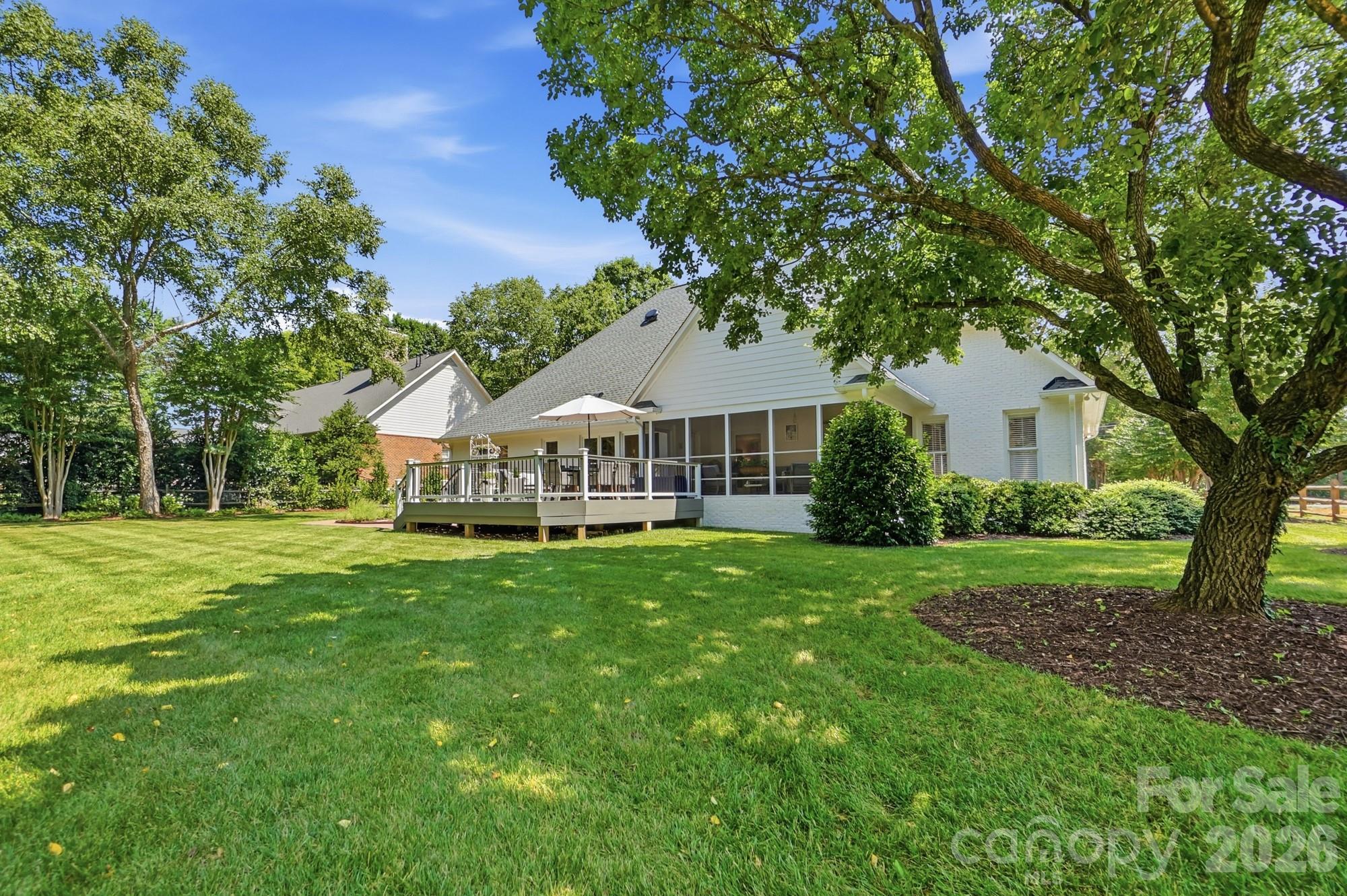 1136 Concord Road Davidson, NC 28036 - Photo 30 of 34 a front view of a house with garden