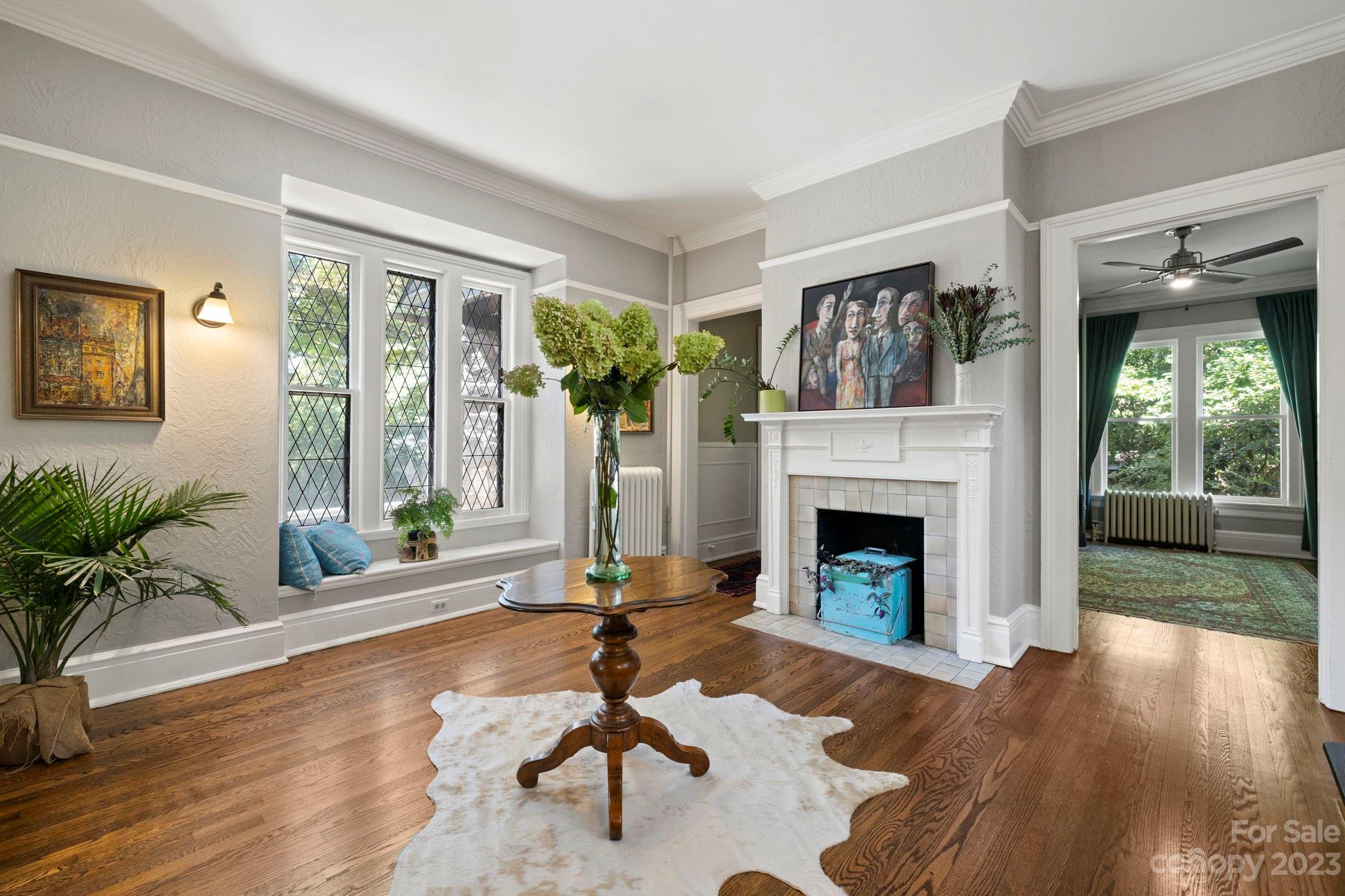 18 Cherokee Road Asheville, NC 28801 - Photo 11 of 45 a living room with furniture and a fireplace