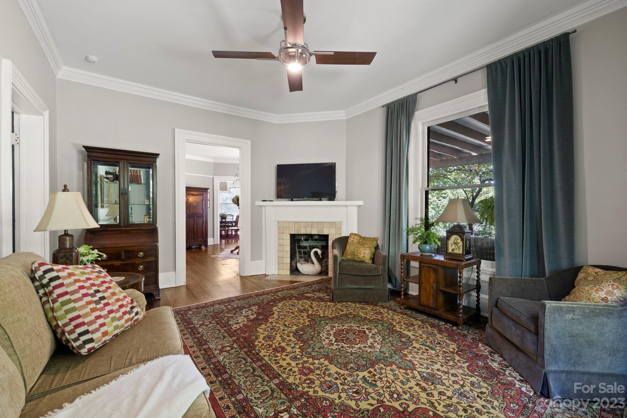 18 Cherokee Road Asheville, NC 28801 - Photo 13 of 45 a living room with furniture and a fireplace