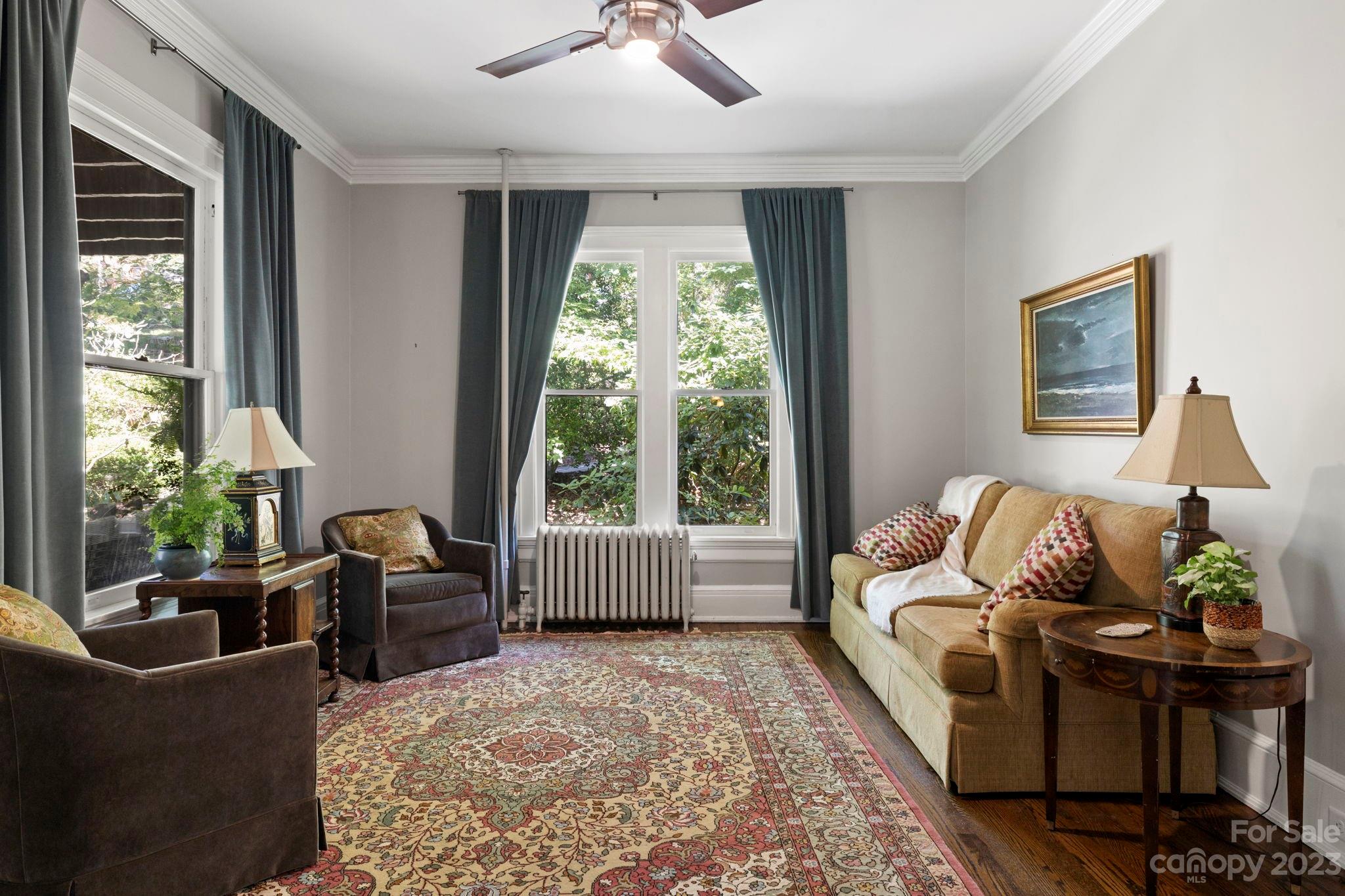 18 Cherokee Road Asheville, NC 28801 - Photo 14 of 45 a living room with furniture and a large window