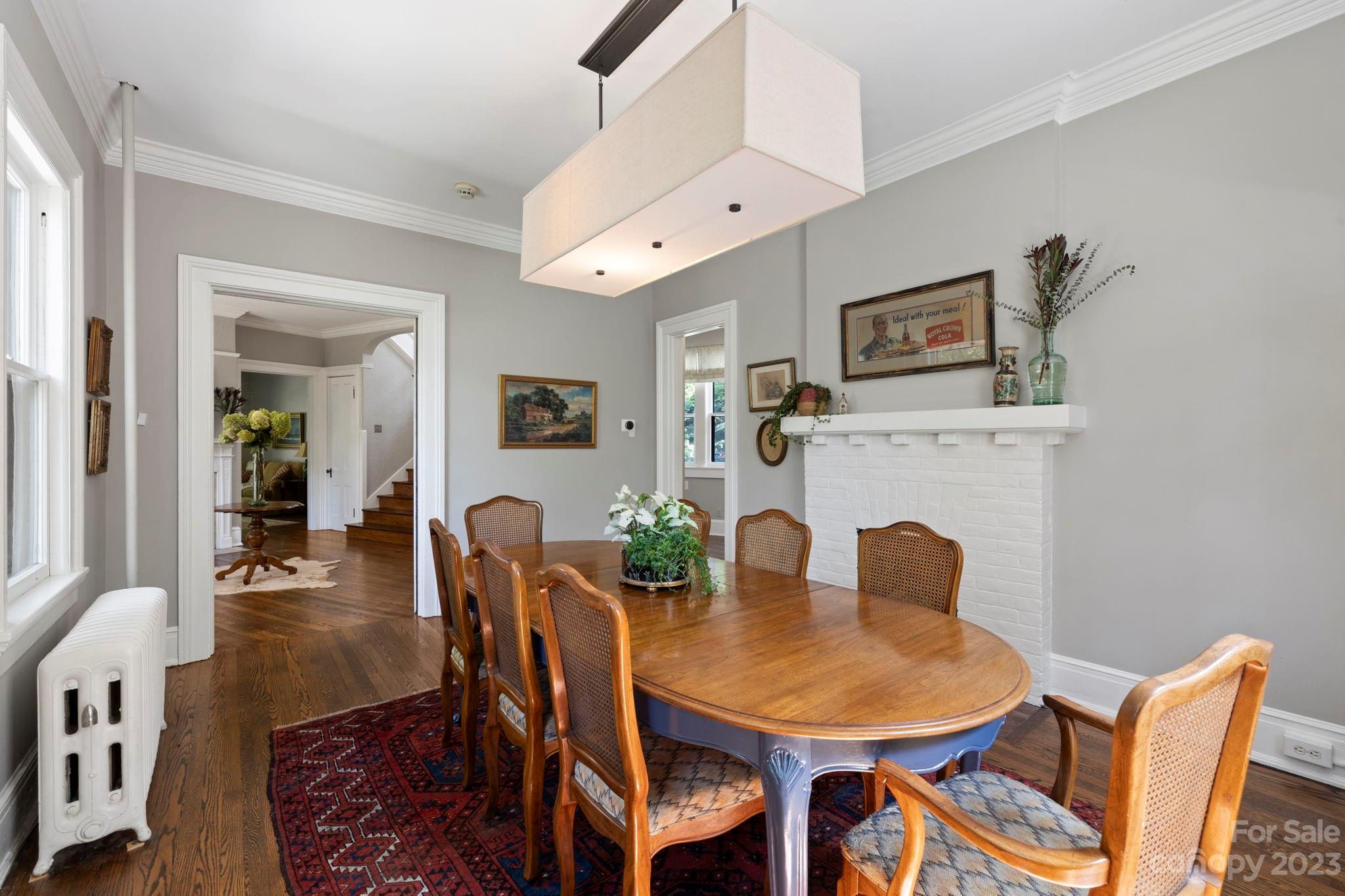18 Cherokee Road Asheville, NC 28801 - Photo 16 of 45 a view of a dining room with furniture