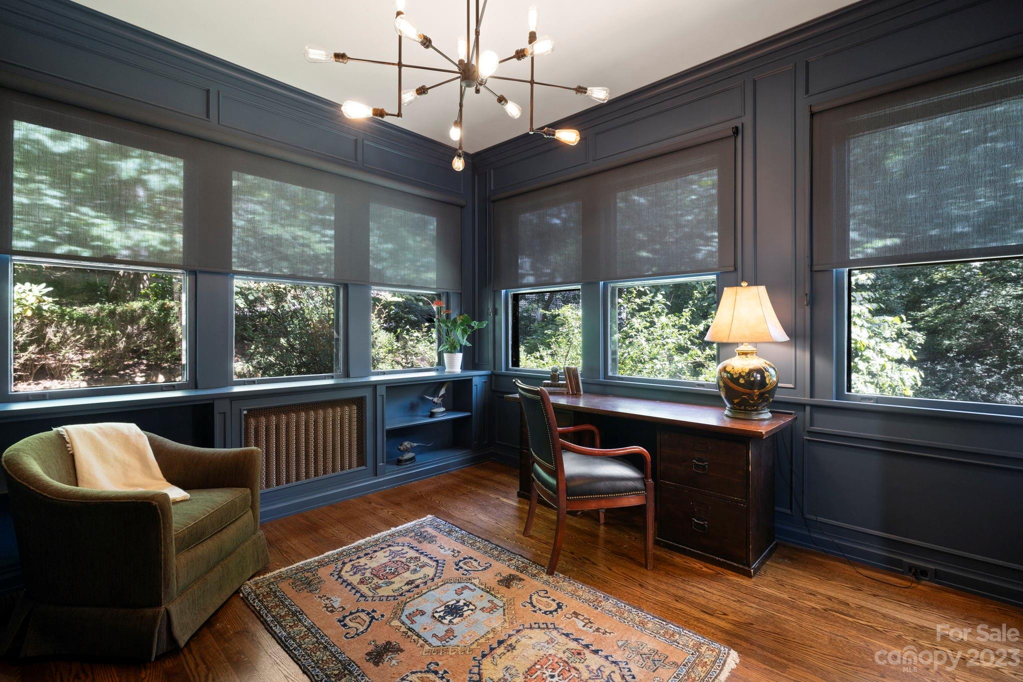 18 Cherokee Road Asheville, NC 28801 - Photo 20 of 45 a living room with furniture and a large window