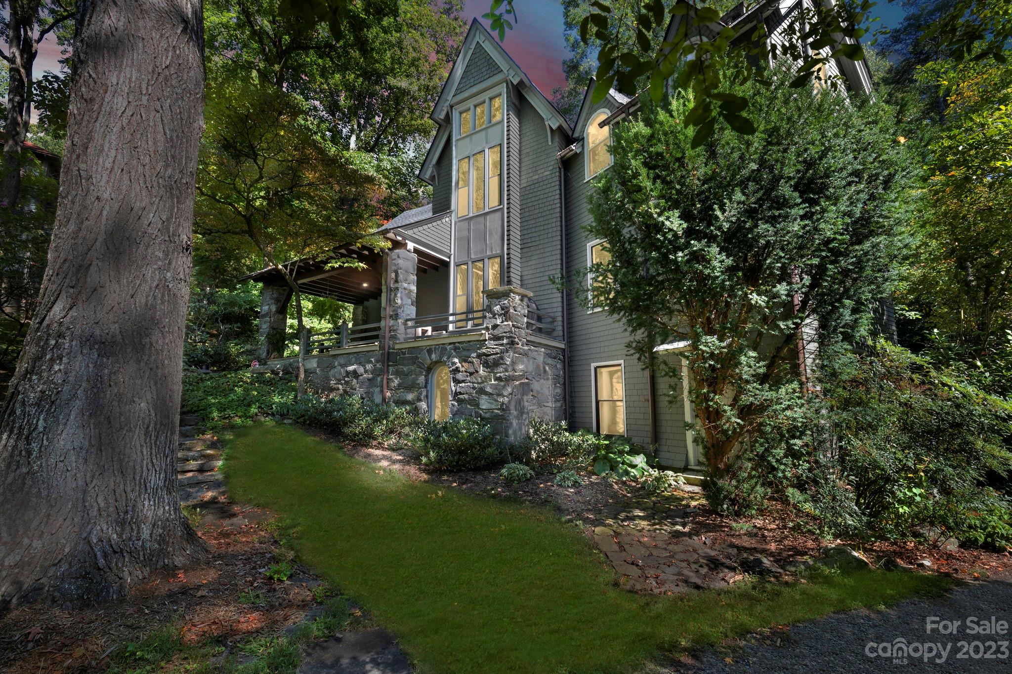 18 Cherokee Road Asheville, NC 28801 - Photo 2 of 45 a view of a house with a yard