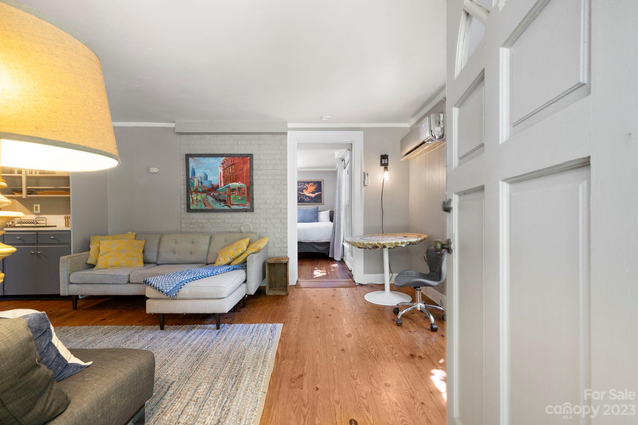 18 Cherokee Road Asheville, NC 28801 - Photo 33 of 45 a living room with furniture and a table