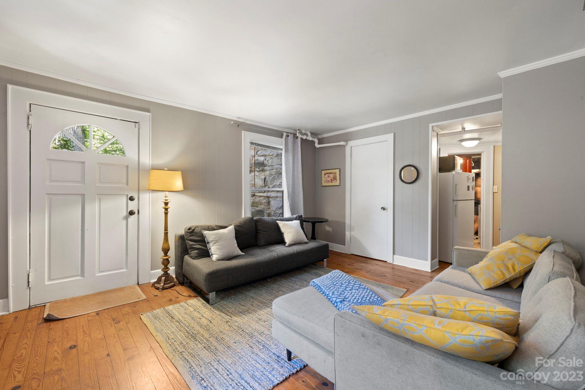 18 Cherokee Road Asheville, NC 28801 - Photo 34 of 45 a living room with furniture and a rug