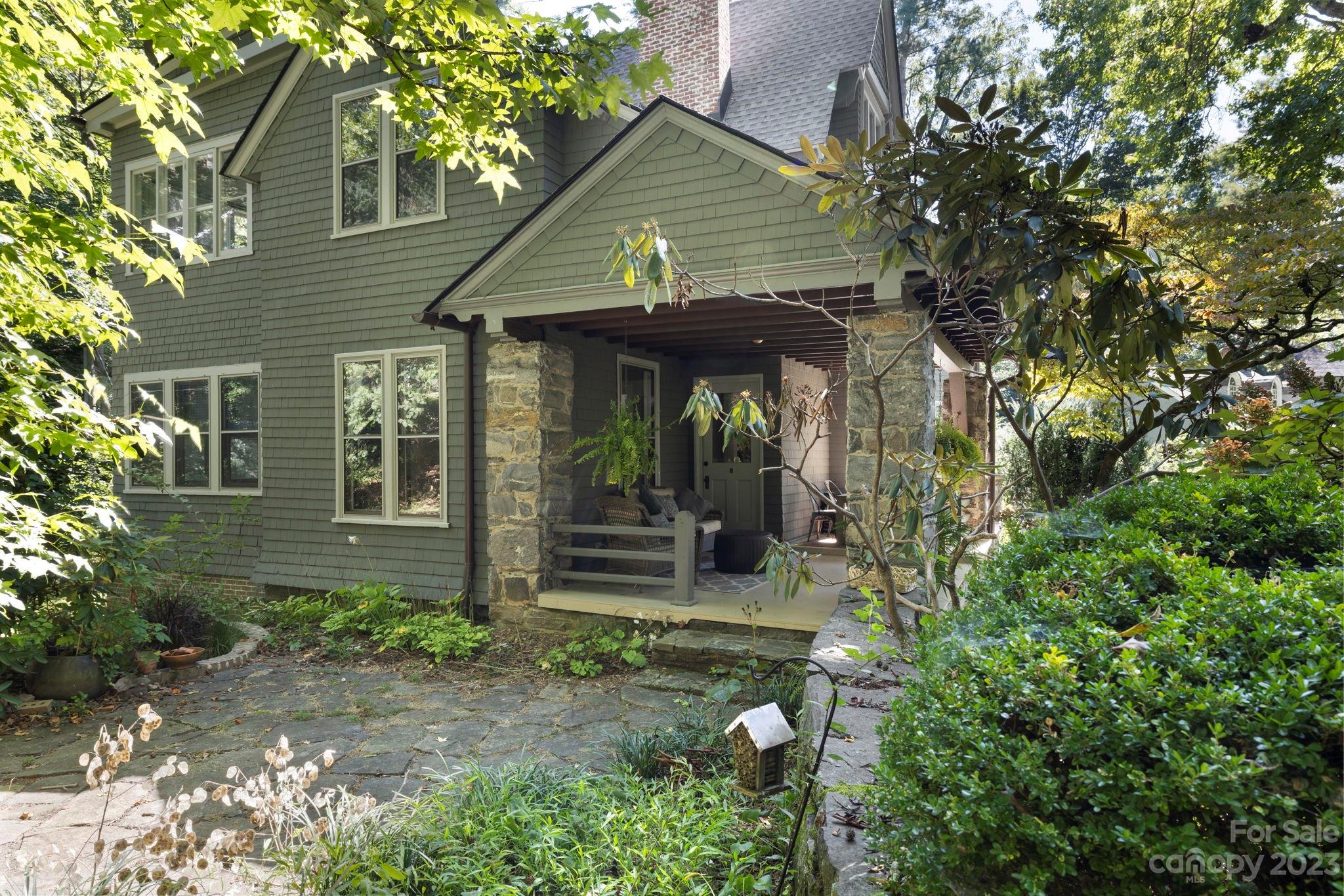 18 Cherokee Road Asheville, NC 28801 - Photo 7 of 45 a front view of a house with a yard