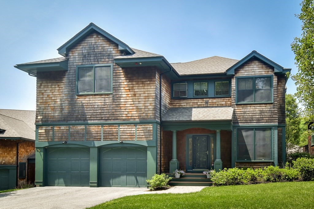 7 Hawthorne Lane, Unit 7 Dover, MA 02030 - Photo 1 of 30 a front view of a house with garden