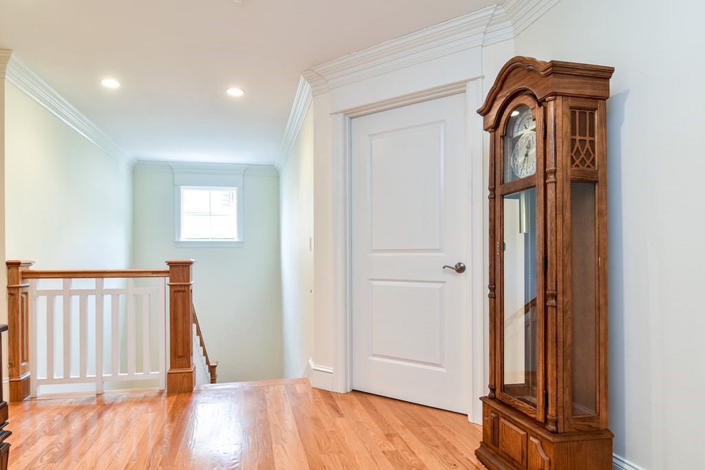 7 Hawthorne Lane, Unit 7 Dover, MA 02030 - Photo 16 of 30 a view of front door with wooden floor