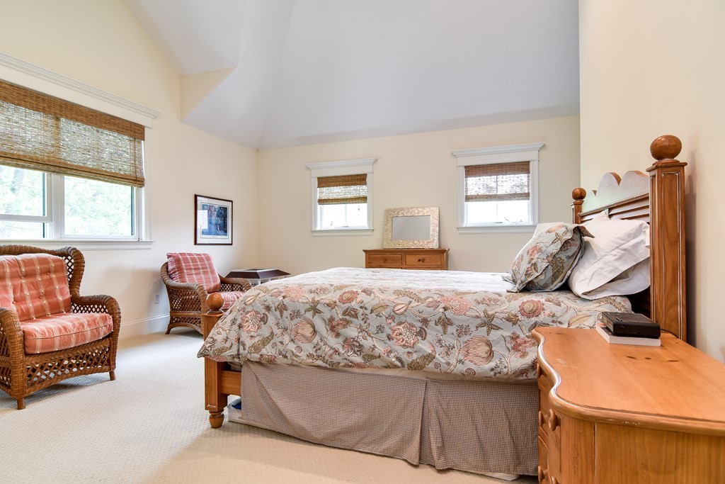 7 Hawthorne Lane, Unit 7 Dover, MA 02030 - Photo 17 of 30 a bedroom with a bed and a couch