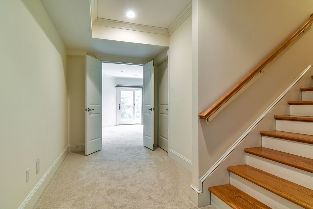 7 Hawthorne Lane, Unit 7 Dover, MA 02030 - Photo 23 of 30 a view of entryway with wooden floor