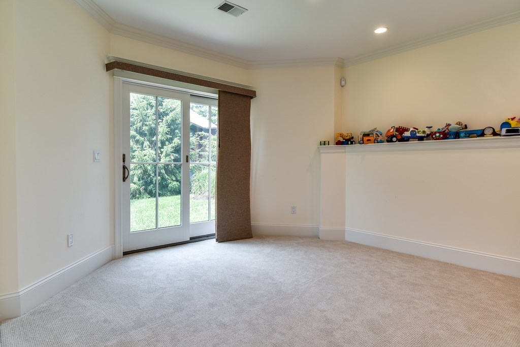 7 Hawthorne Lane, Unit 7 Dover, MA 02030 - Photo 26 of 30 a view of an empty room with a window